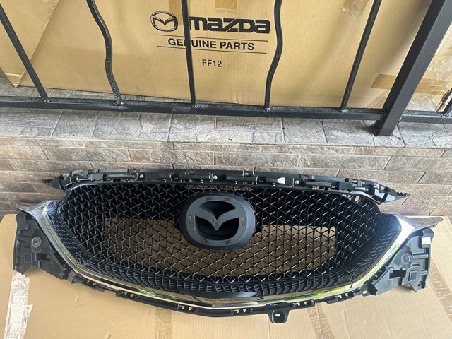 Купити KB8A50710K Mazda Захисна решітка радіатора