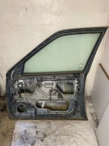 Купити Двері праві передні Daewoo Espero  KLEJ