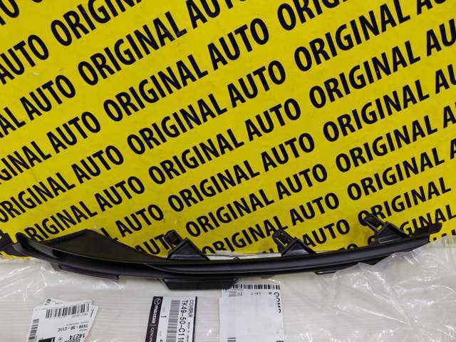 Окантовка фари протитуманною Mazda TK4950C11C