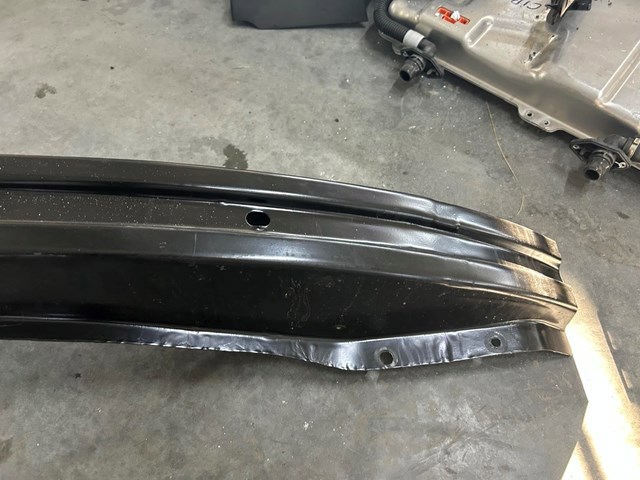 Наповнювач бампера заднього Tesla 104168500A ціна, від 50.44 USD