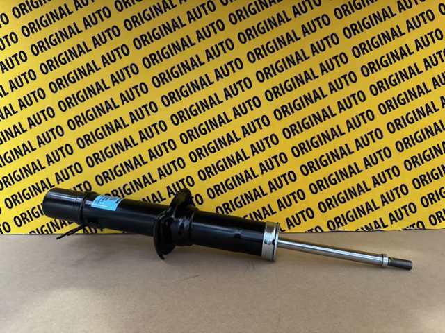 Купити KJK334900 Mazda Амортизатора передній лівий