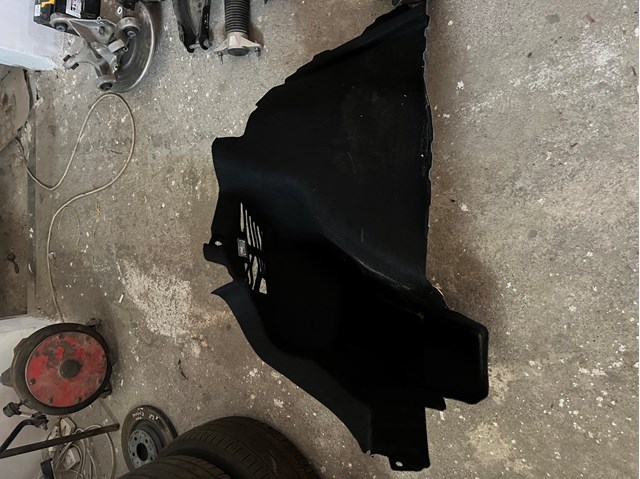Купити 108293200K Tesla Облицювання багажного відсіку, ліве