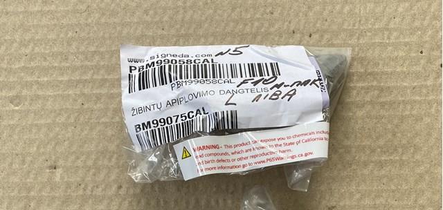 Купити PBM99058CAL Signeda Накладка форсунки омивача фари передньої