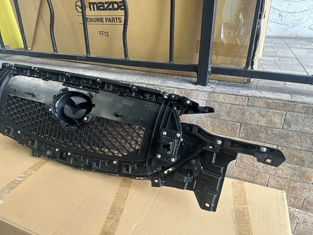 Облицювання радіатора Mazda KB8A50710K ціна, від 137.57 USD