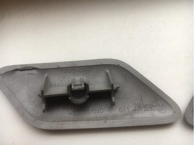 Купити TQ25334 Tqparts Накладка форсунки омивача фари передньої
