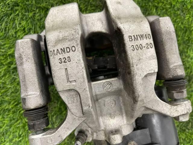 34206894079 BMW Супорт гальмівний задній лівий