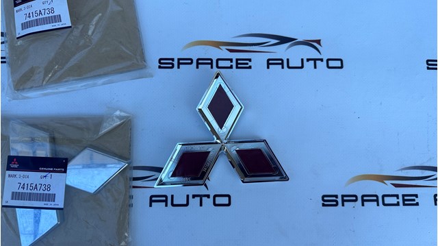 Емблема на решітку радіатора Mitsubishi 7415A738 ціна, від 28.42 USD