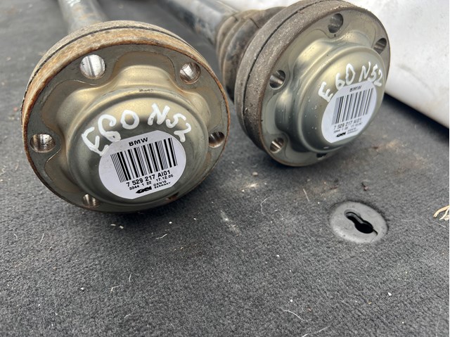 7529217 BMW Піввісь задня, ліва