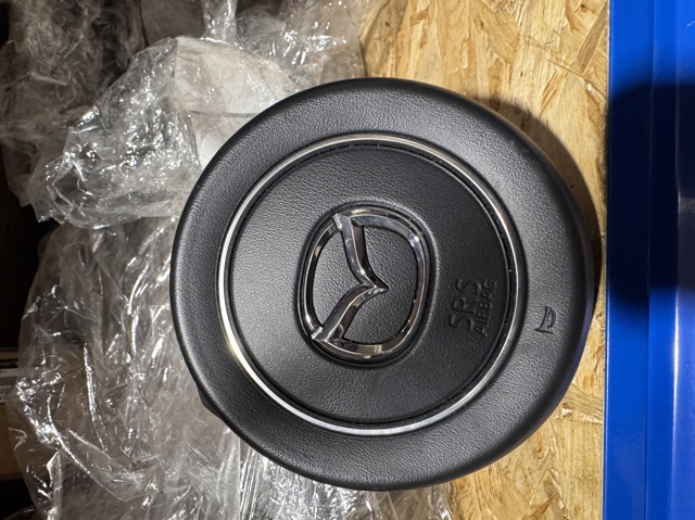 Купити KMV757K0002 Mazda Подушка безпеки водія