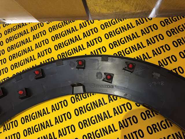 Молдинг передньої арки колеса, правий Mazda DFR551W20C ціна, від 31.85 USD