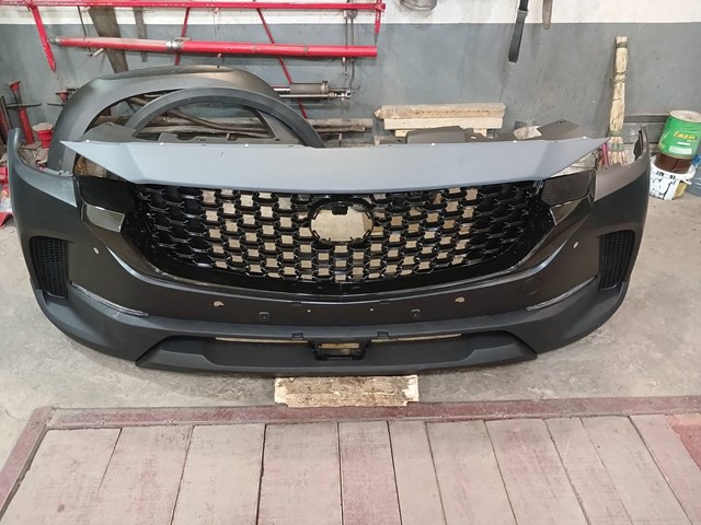 Купити VA40501T4 Mazda Нижня накладка на передній бампер