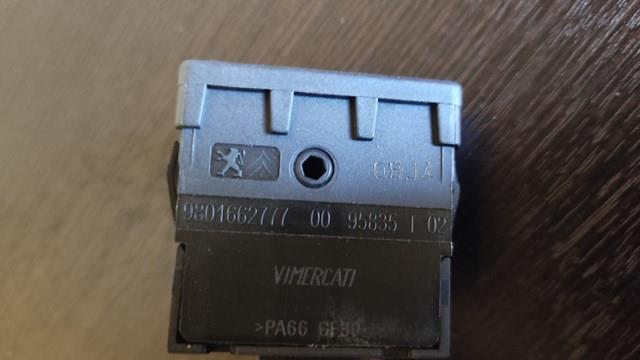 98016627ZD Peugeot/Citroen Кнопка коректора фар
