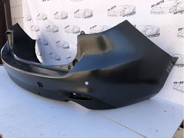 Бампер задній Mazda GHP950221