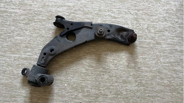 Купити TC3M34300 Mazda Важіль передньої підвіски нижній, правий