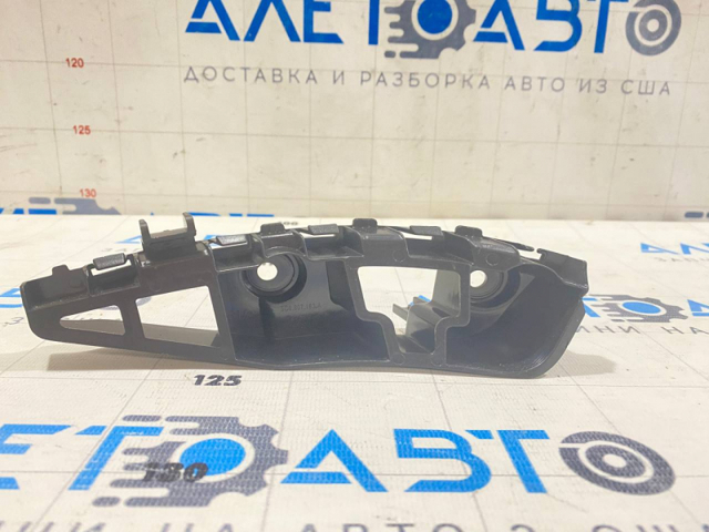 30807417 AND Кронштейн бампера переднього, зовнішній лівий