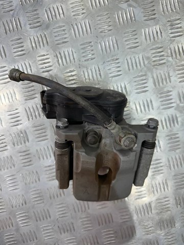 D40106RA0A Nissan/Infiniti Супорт гальмівний задній лівий