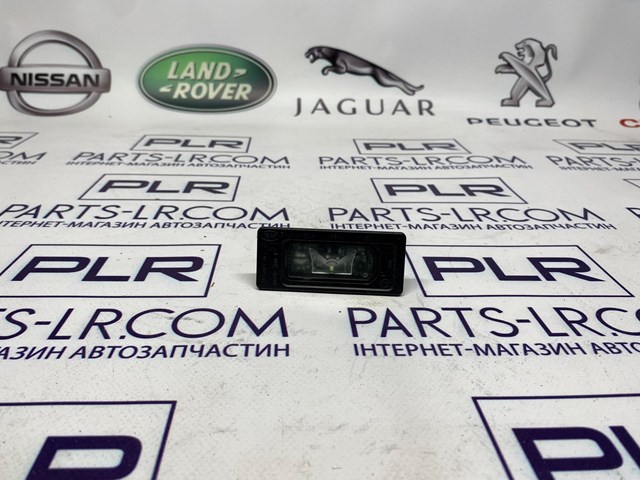 Ліхтар підсвічування заднього номерного знака LR089442 Land Rover