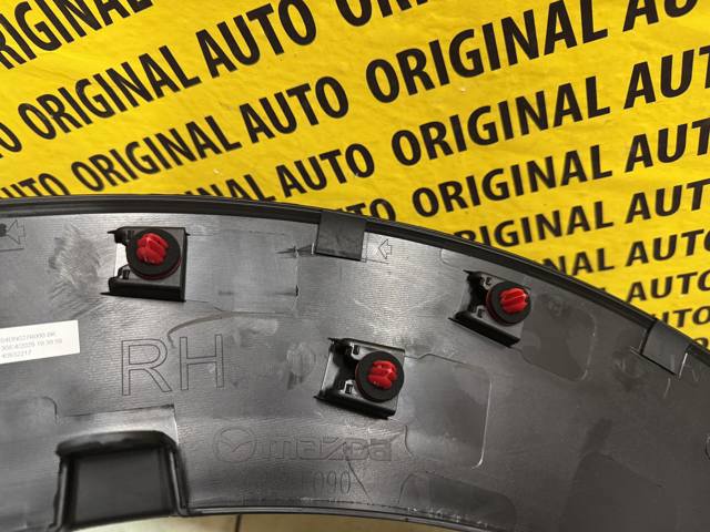 Молдинг передньої арки колеса, правий Mazda DGH951W20 ціна, від 54.13 USD