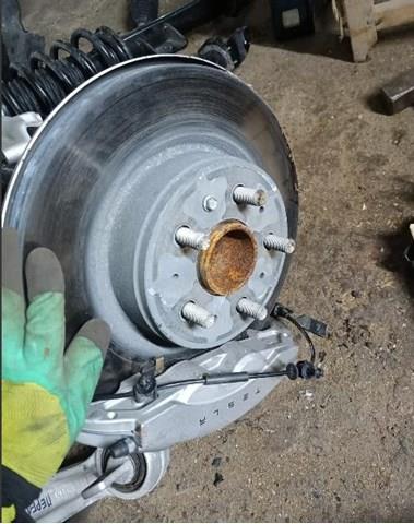 Купити 1044665C Tesla Захист гальмівного диска заднього, лівого