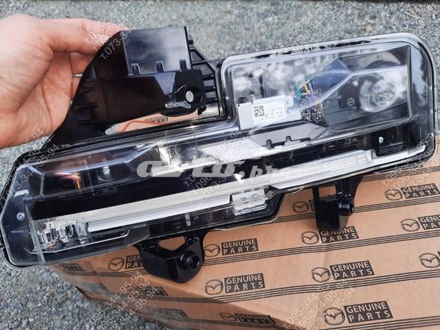 Покажчик повороту лівий Mazda DGH951070