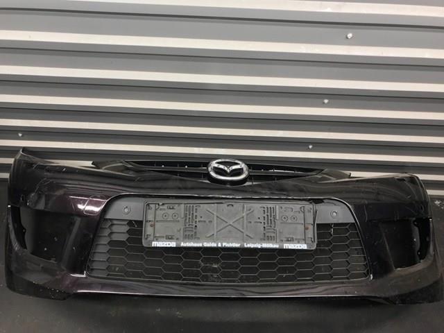 Передній бампер C29150031BAA Mazda