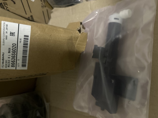 Форсунка омивача фари передньої, лівою TQ21271 Tqparts