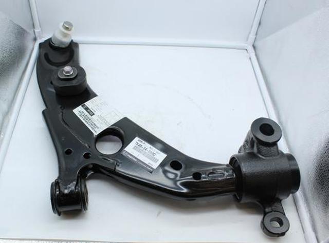 TC3M34300A Mazda важіль передньої підвіски нижній, правий - купити