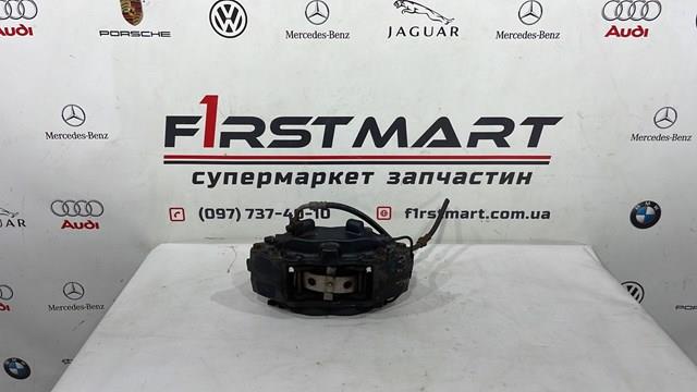 104263900F Tesla Супорт гальмівний, передній, лівий