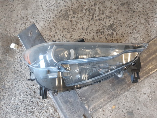 Фара права K12451030 Mazda