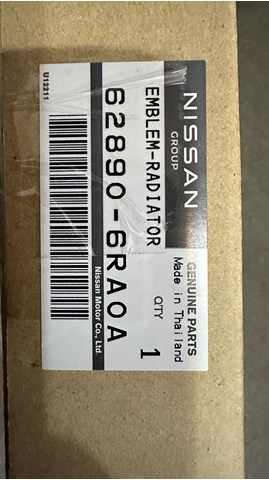 Емблема решітки радіатора 628906RA0A Nissan/Infiniti