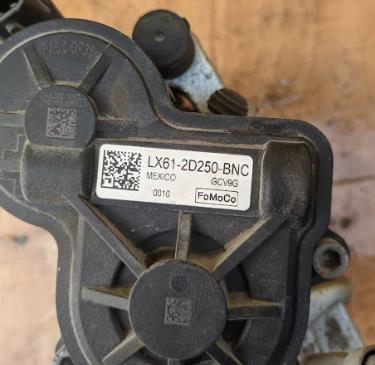 JX6Z2386L Ford Супорт гальмівний задній правий