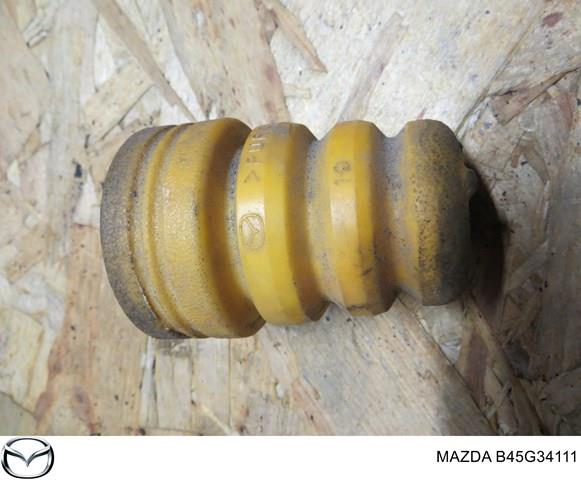 Буфер-відбійник амортизатора переднього B45G34111 Mazda