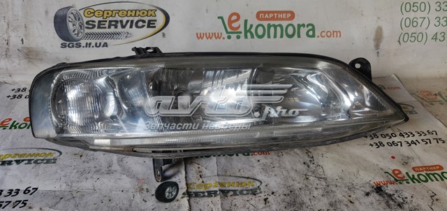 Фара права 90586845 General Motors