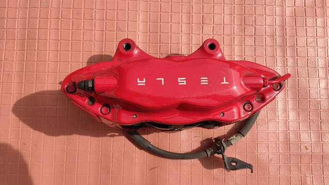 Супорт гальмівний передній правий 100779501D Tesla